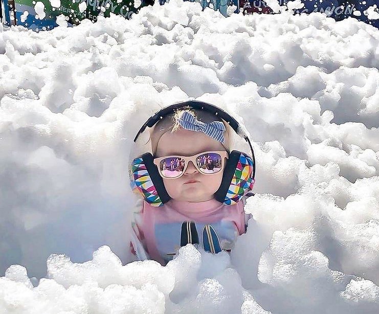 Baby enjoying foam party