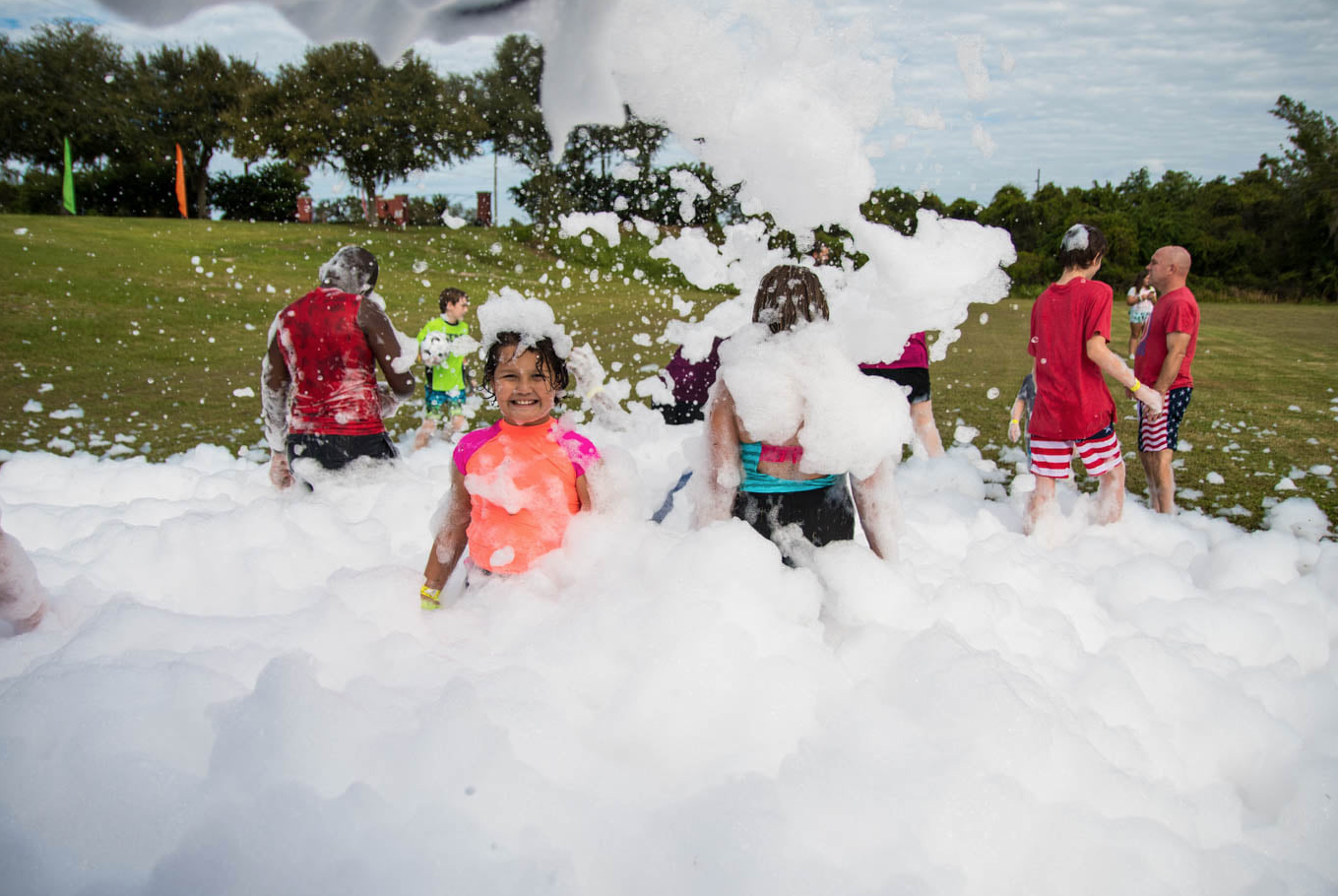 Kids playing in foam at park